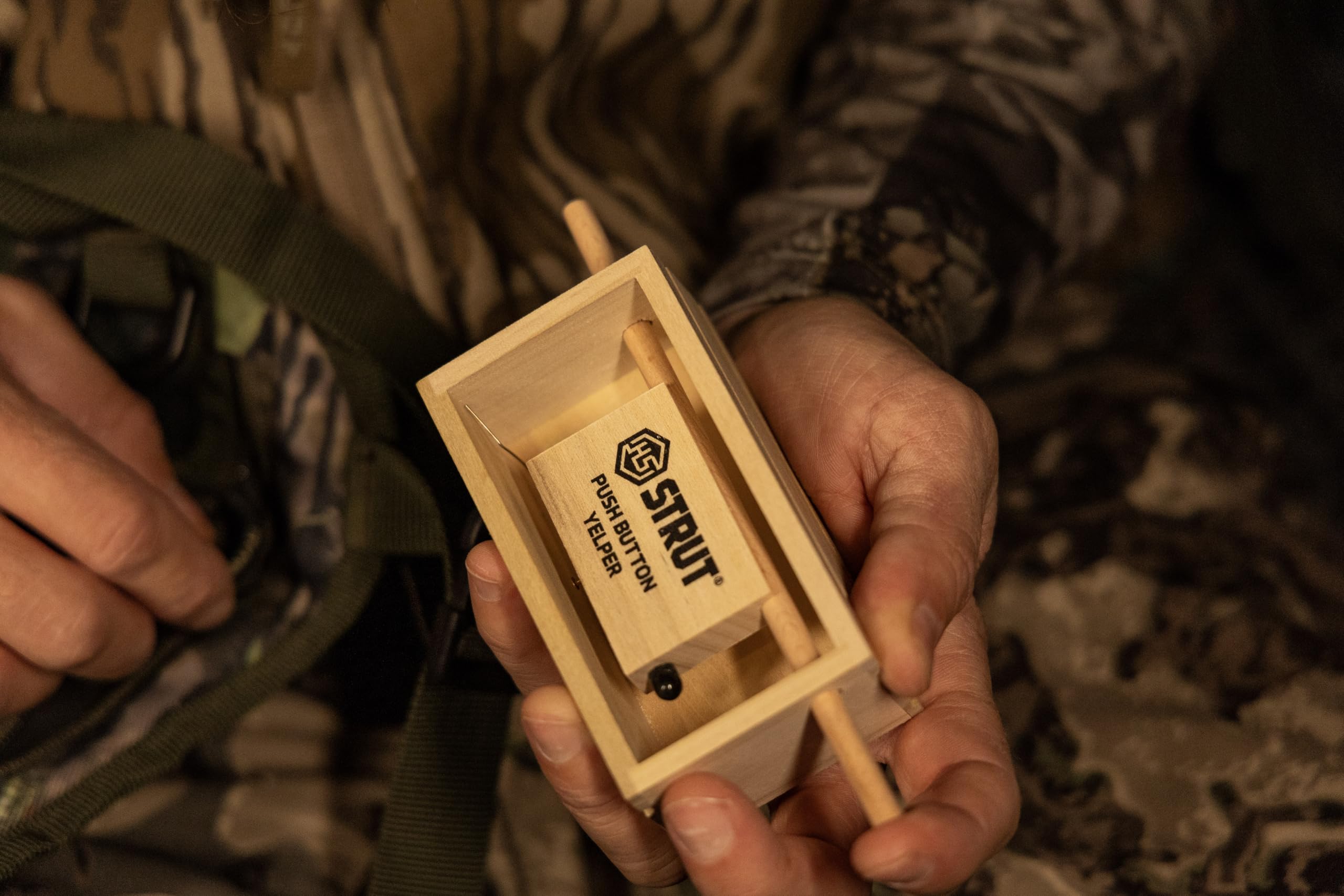 Hunters Specialties Strut Push Button Yelper walnut and poplar construction for realistic turkey calls.