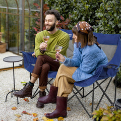 Huskfirm double camping chair 2-person setup, ideal for shared picnics and outdoor lounging.