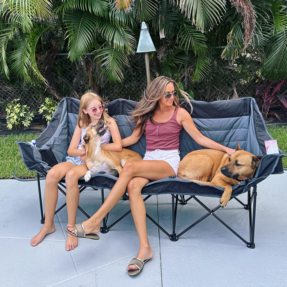Huskfirm oversized chair features two cup holders on each side for drinks.