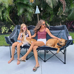 Huskfirm oversized chair features two cup holders on each side for drinks.
