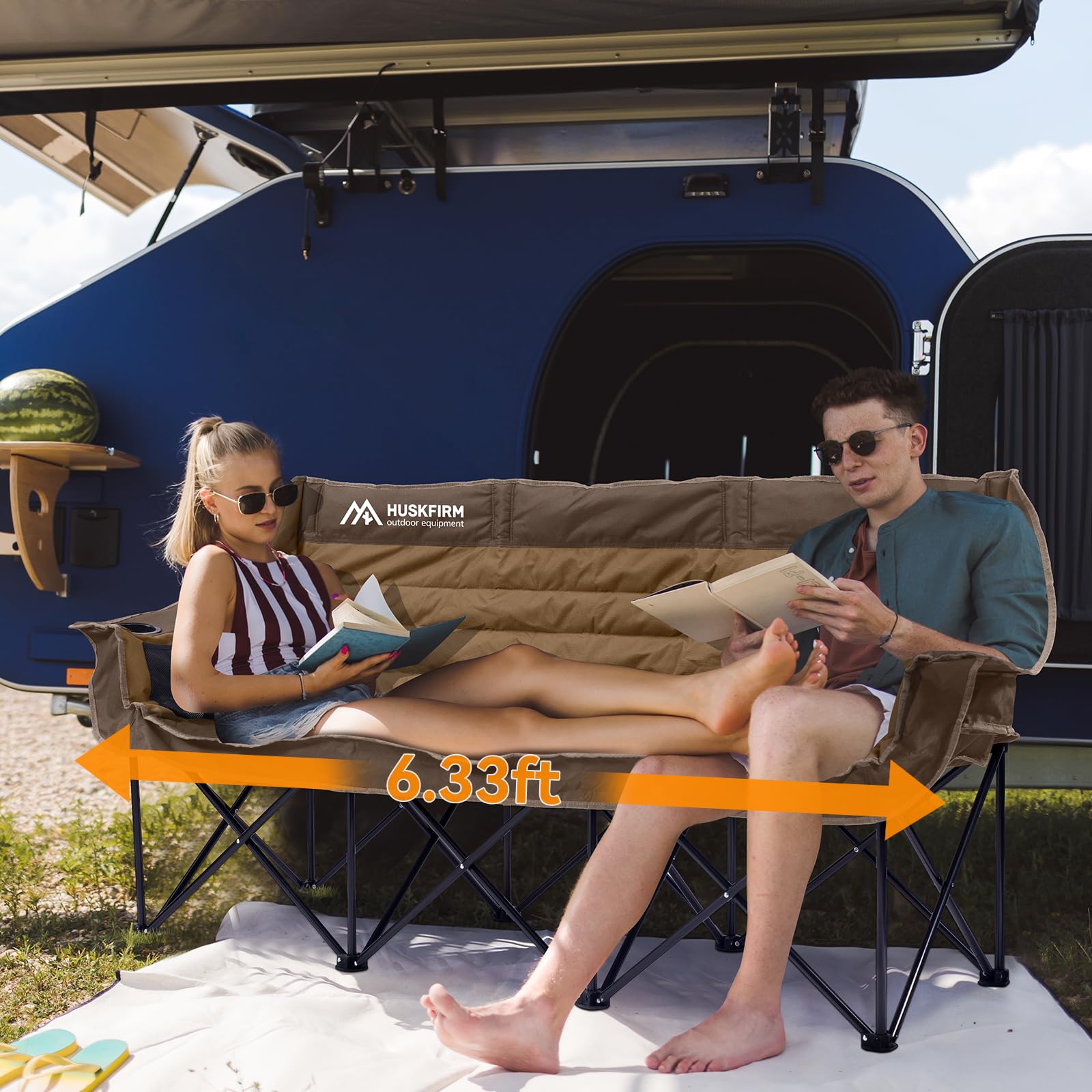Huskfirm oversized loveseat camping chair set up for comfortable family outdoor lounging.