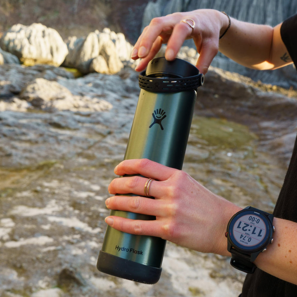 Hydro Flask 32oz lightweight trail bottle with flex cap close-up for easy access
