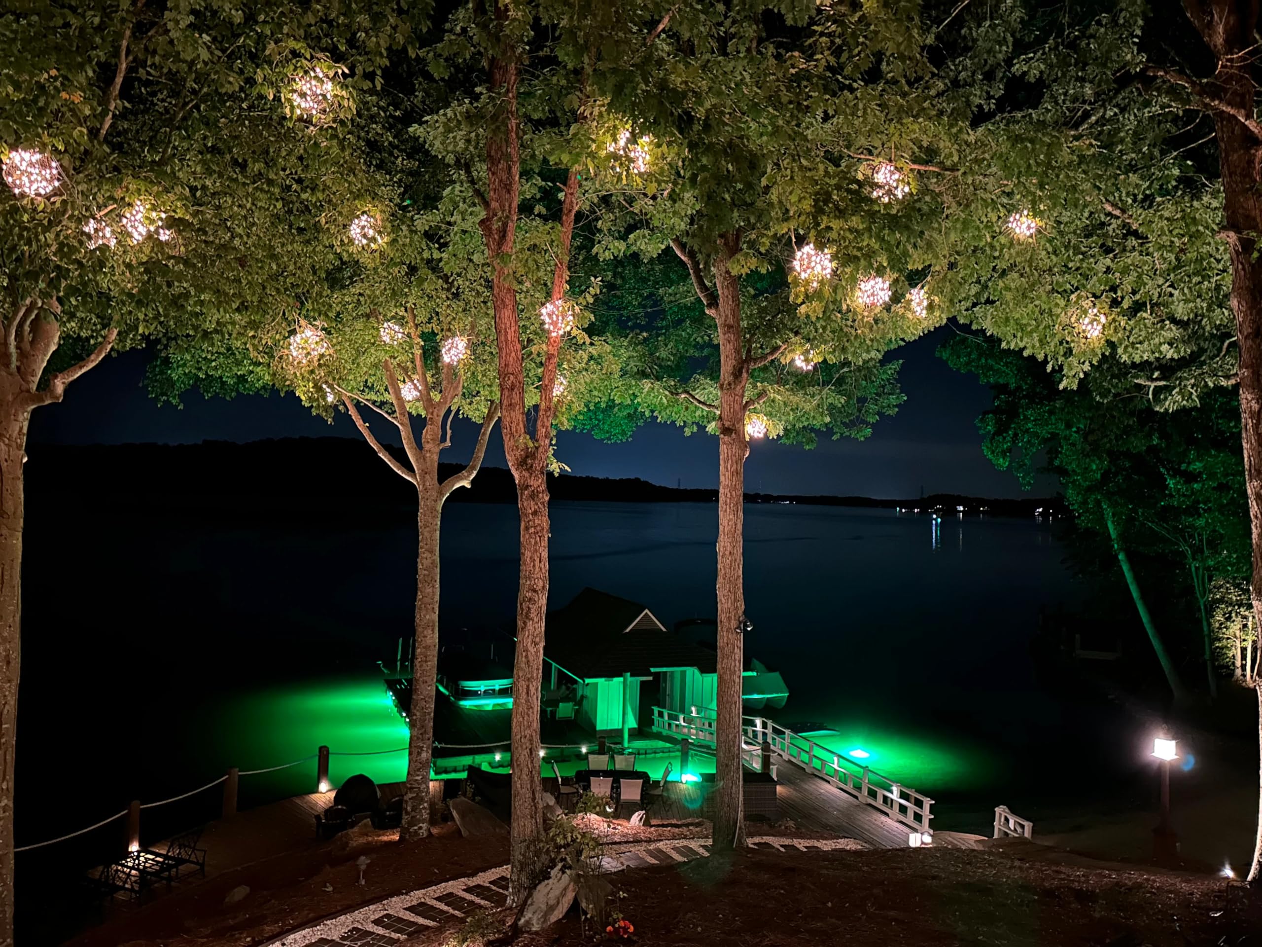 Hydro Glow green LED underwater illumination enhances pier visibility and ambiance.