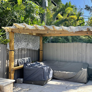 HYOUT camo netting woodland pattern closeup showcases authentic blending for leafy environments.