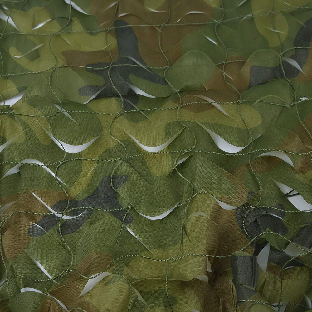 HYOUT camo netting at a camping setup providing shade and stealth ambience.