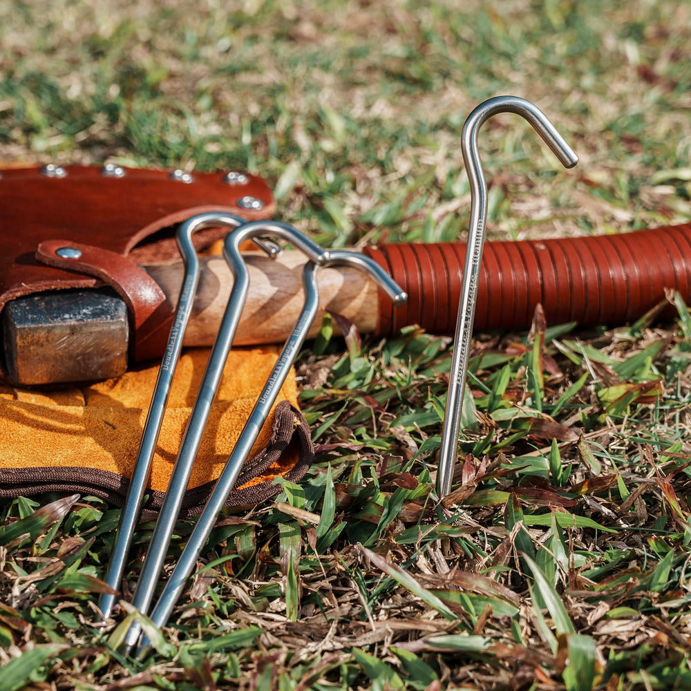 iBasingo peg securely set in hard soil demonstrates strong hold