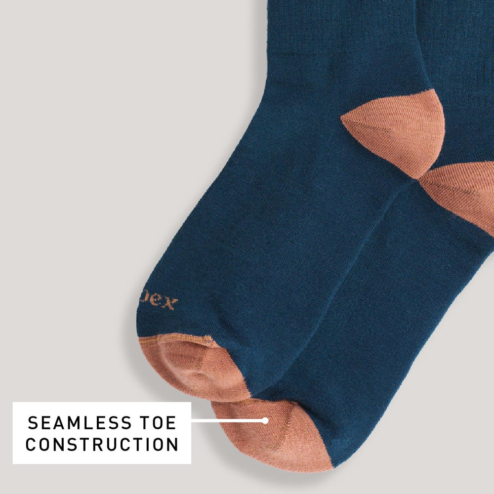 IBEX Rambler Merino Wool socks with arch support for trail stability.