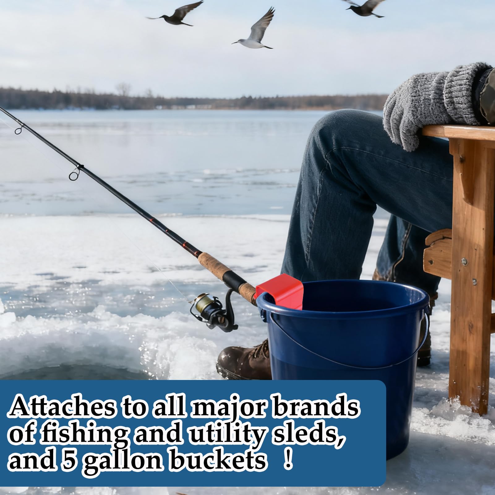 Red ice fishing gear on riverbank with sled