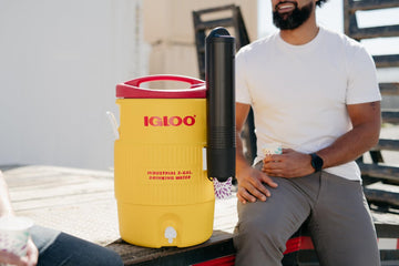 Igloo cooler with sturdy side handles for easy carrying