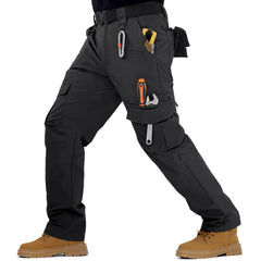 IGOLUMON pants fabric closeup shows tear-resistant ripstop for rugged work.