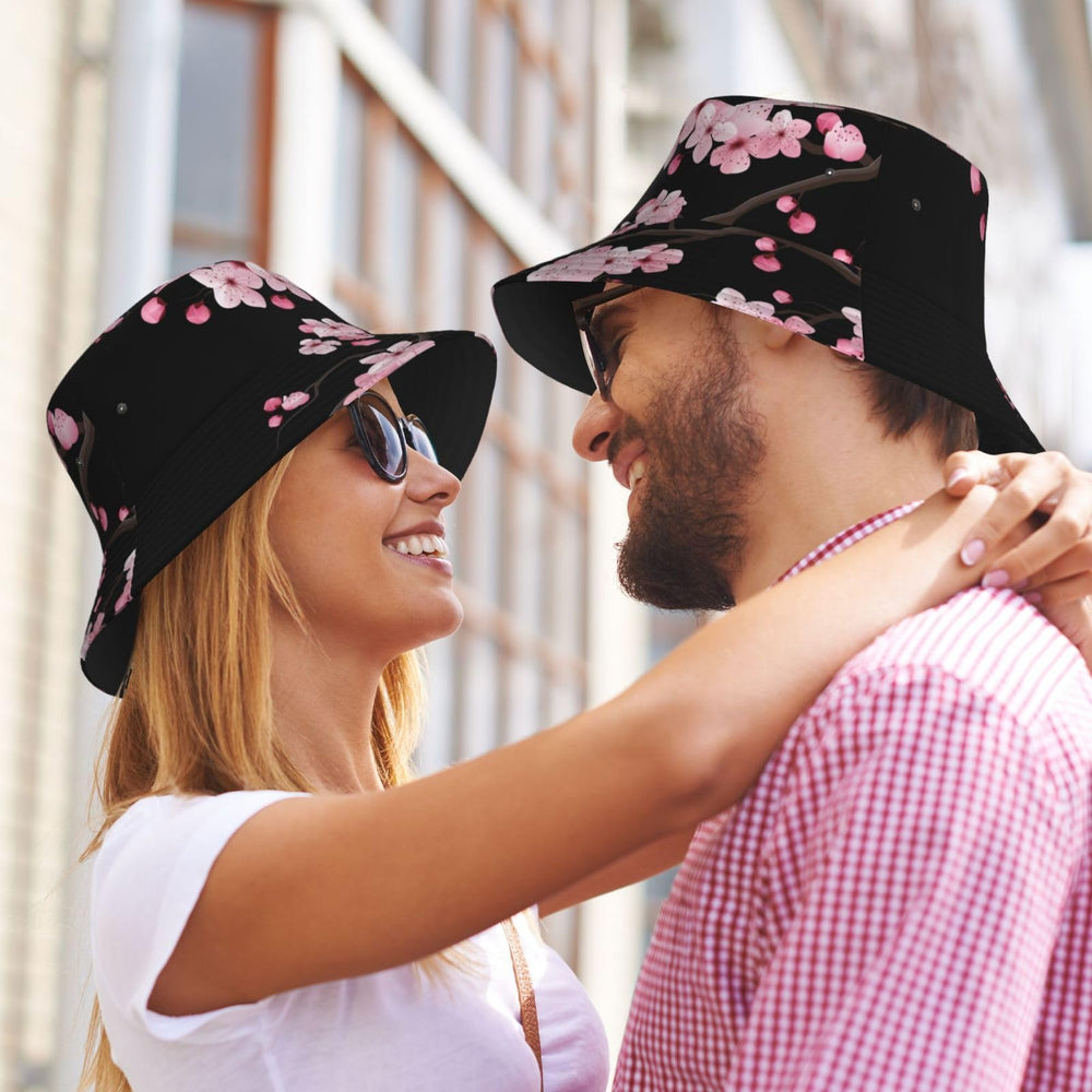 ILEABEC Cherry Blossoms bucket hat in use at the beach