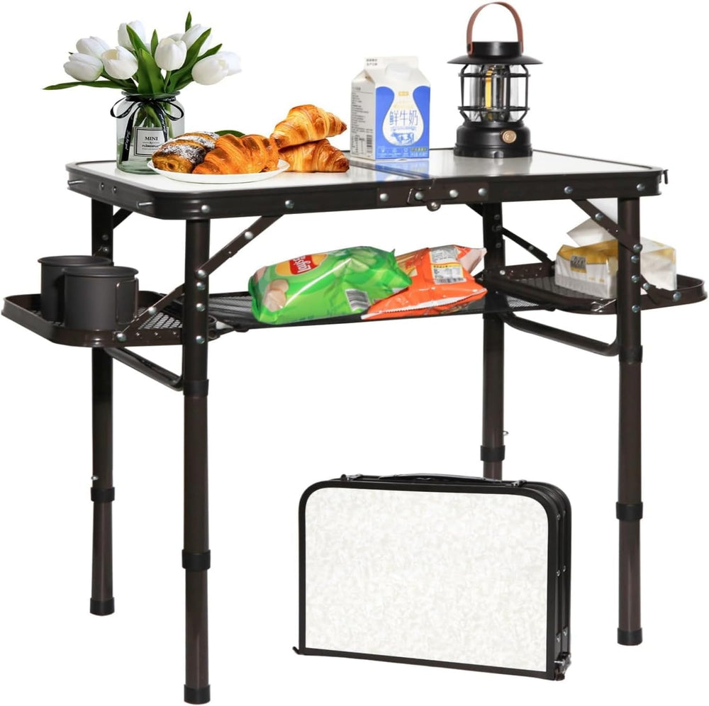 Koldan folding table open for easy outdoor picnic setup and prep space.