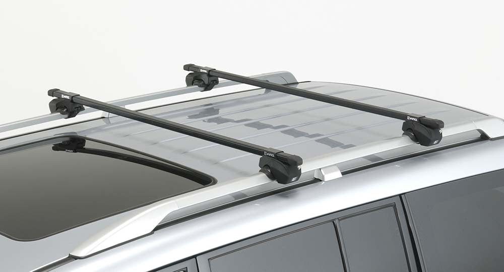 INNO stainless steel straps protect rails while securing loads safely.