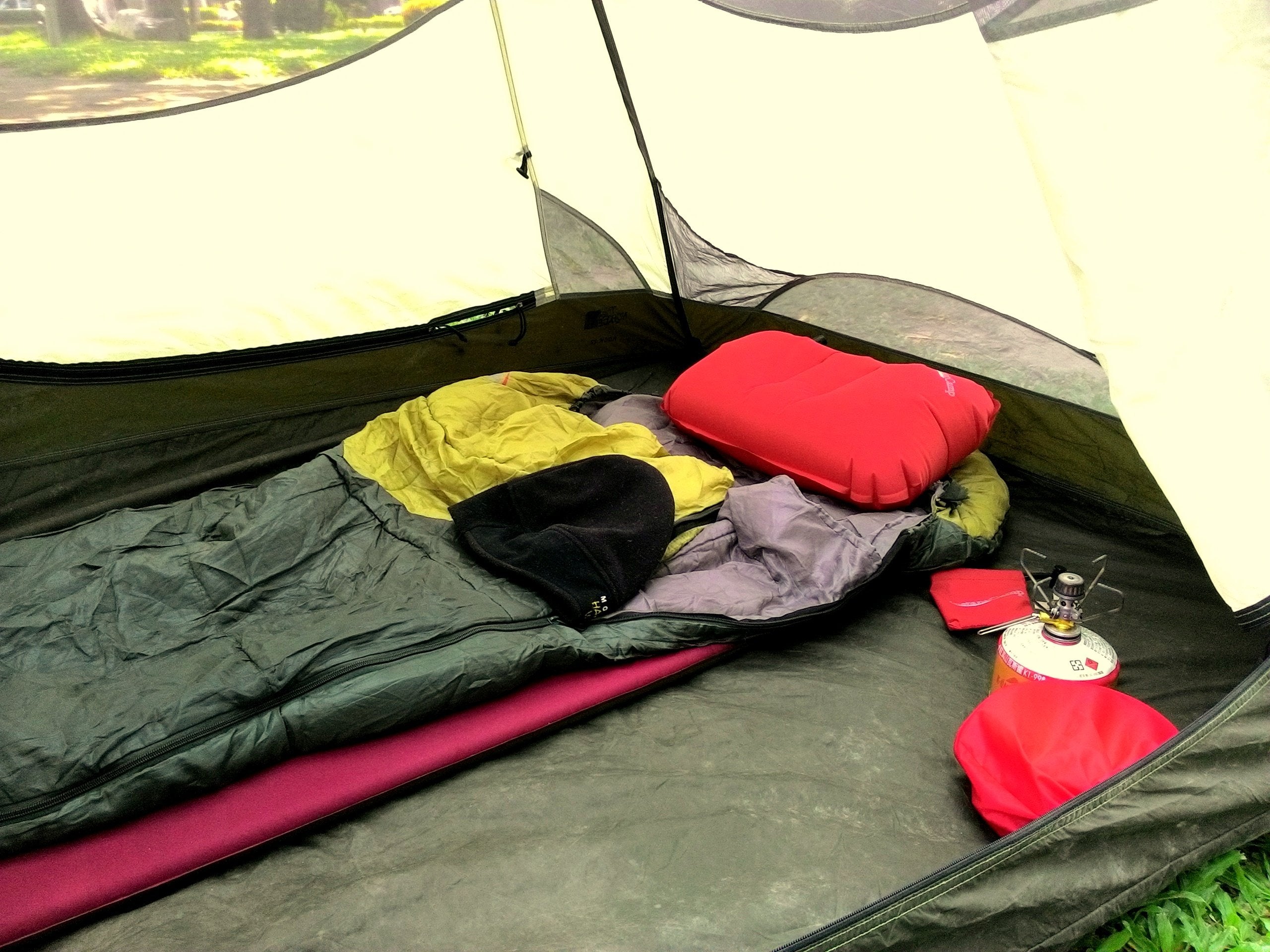 InstantCamp Ultra Light Pillow packs into a small travel pouch for backpackers.
