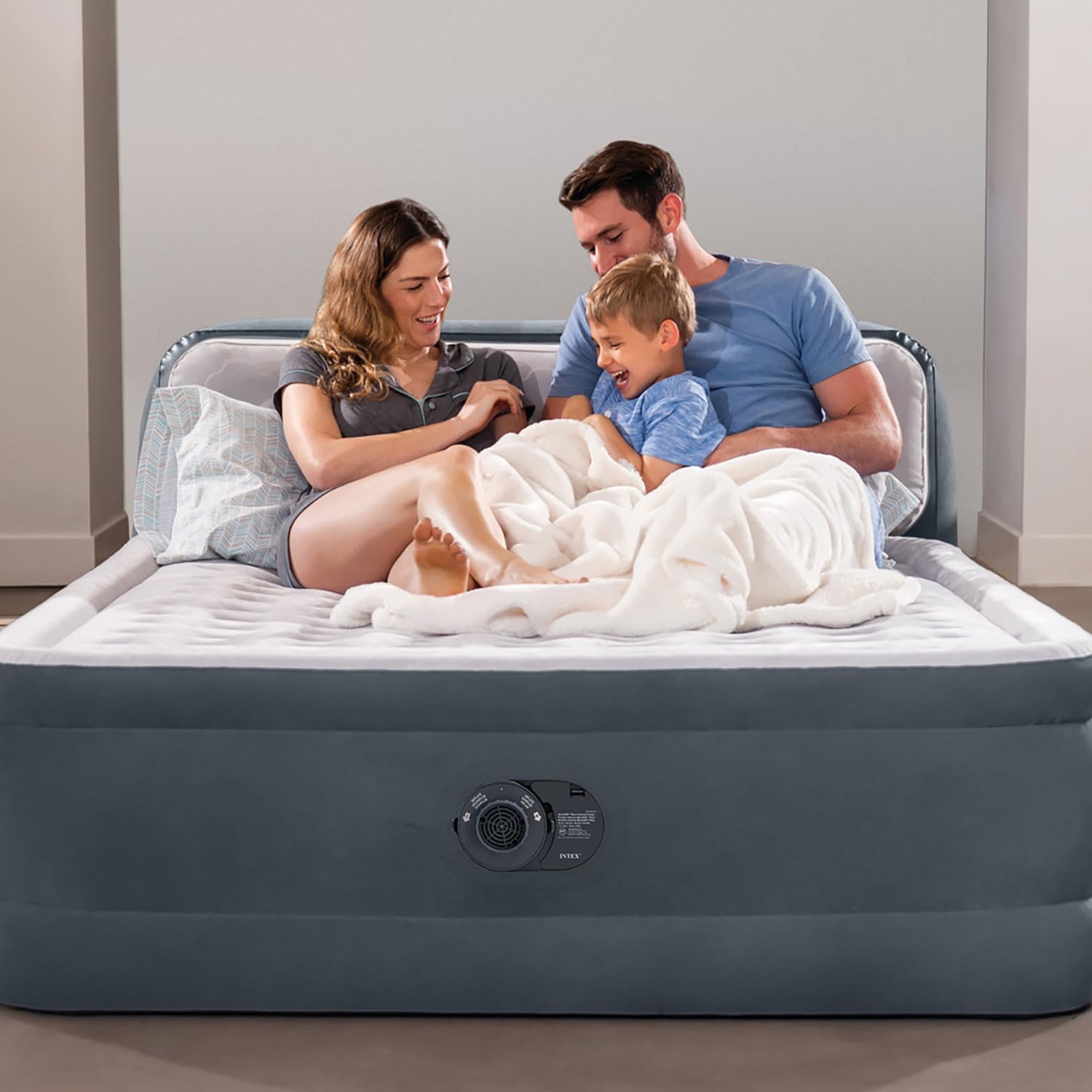 Intex 64447ED built-in electric pump in use for quick inflation.
