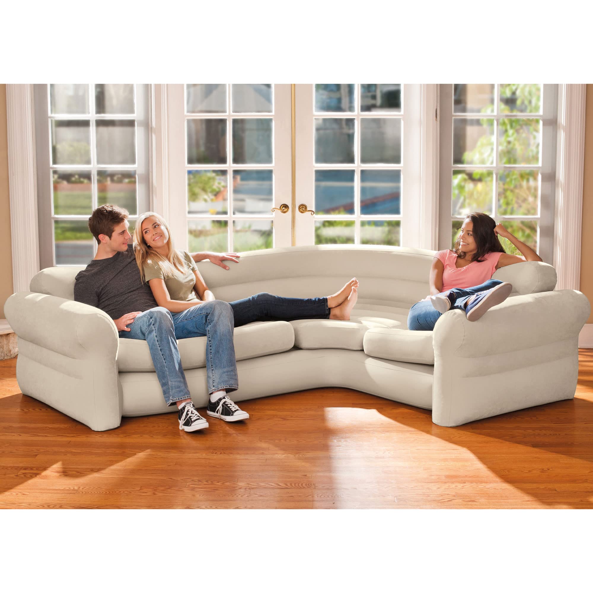 Intex inflatable corner sofa provides versatile space for lounging or sleep.