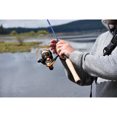 Protective travel case open with rod and reels inside