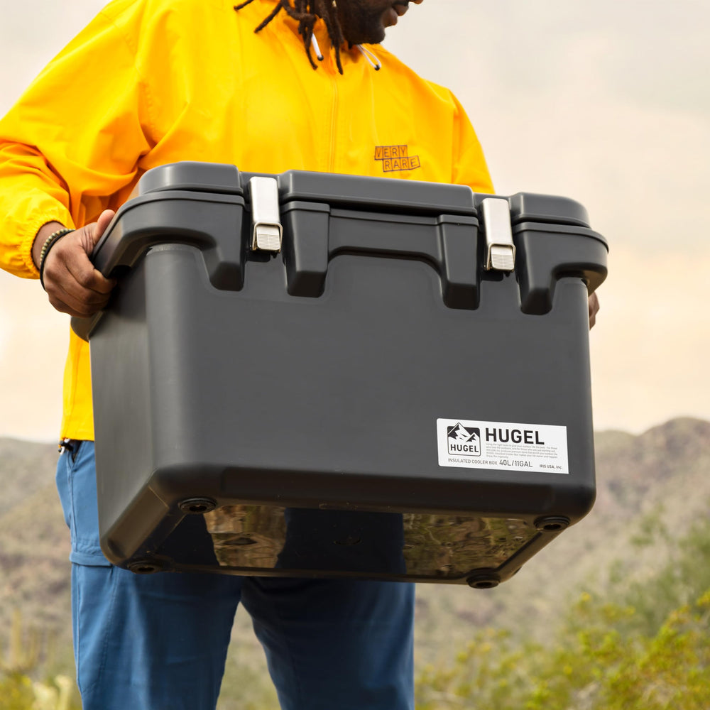 IRIS USA Hugel 44 Qt cooler in outdoor use, ideal for camping and tailgating.