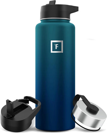 IRON °FLASK 40oz Dark Night bottle in rugged outdoor setting for all-day hydration.