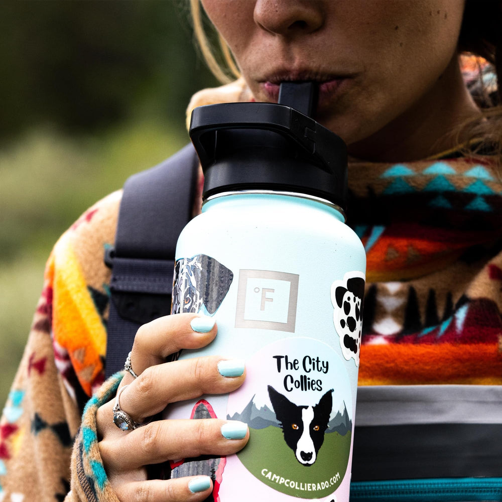 IRON °FLASK Aurora 64oz straw lid closeup demonstrates versatile leak-proof sipping on trails.