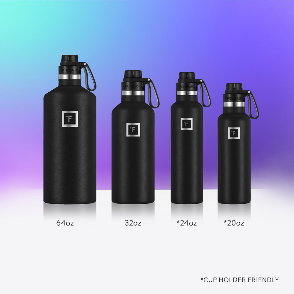 IRON °FLASK Twilight Blue 32 oz bottle in hand, showcasing durable build and grip.