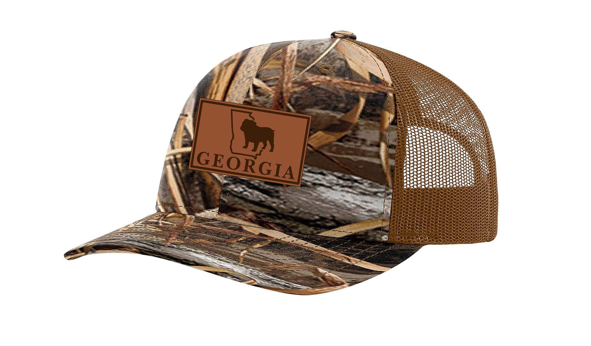 It's All About the South Georgia Bulldog laser-engraved leather patch trucker hat for outdoor wear.