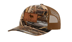 It's All About the South Georgia Bulldog laser-engraved leather patch trucker hat for outdoor wear.