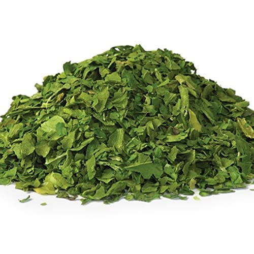 It's Delish dried spinach flakes 8oz bag front with vibrant greens for quick flavor boost.