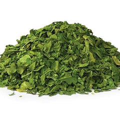 It's Delish dried spinach flakes 8oz bag front with vibrant greens for quick flavor boost.