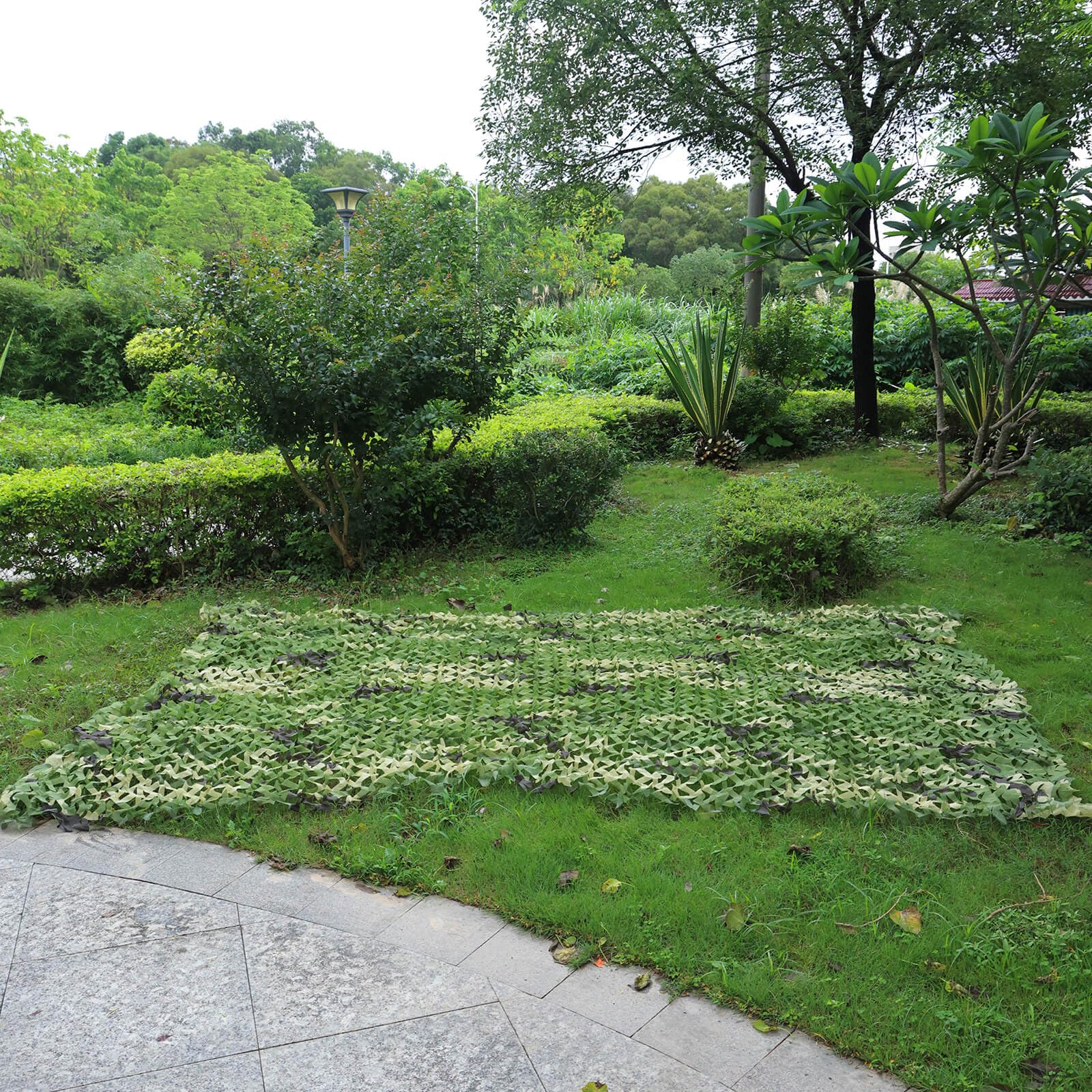 iunio camo netting woodland party decor in rustic setting