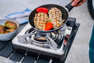 Iwatani Cassette Feu stove compact packaging image underscores portability for travel.