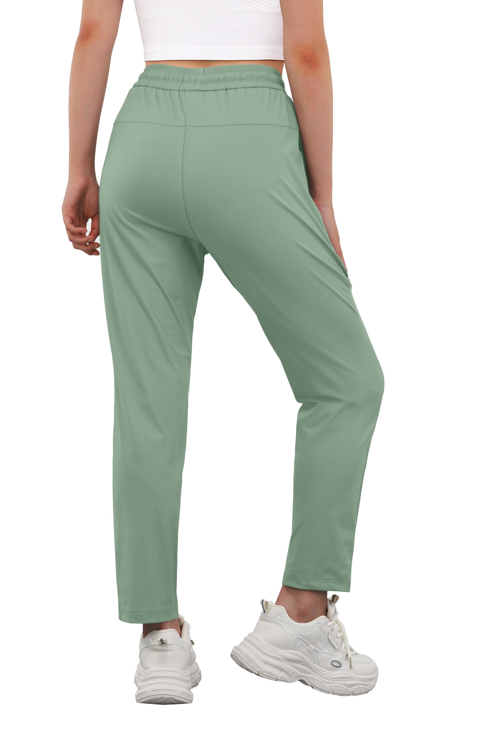 IWOLLENCE travel pants gray-green side view highlighting slim silhouette and flexibility.