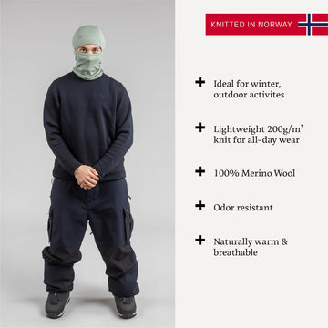 Janus Wool Kleveland balaclava worn on face for versatile cold protection.