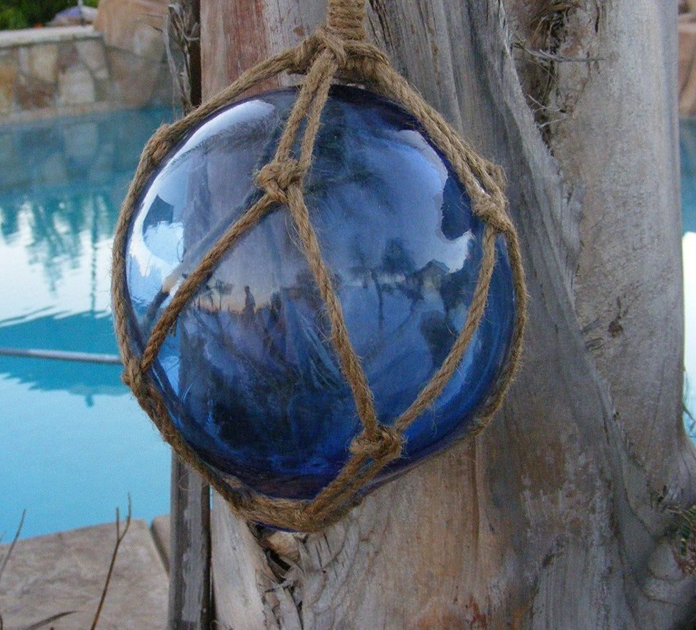 Royal blue Japanese glass fishing float with natural jute rope - front view