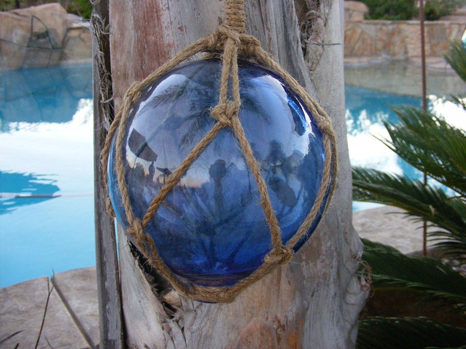 Royal blue Japanese glass fishing float with nautical rope detail - side view