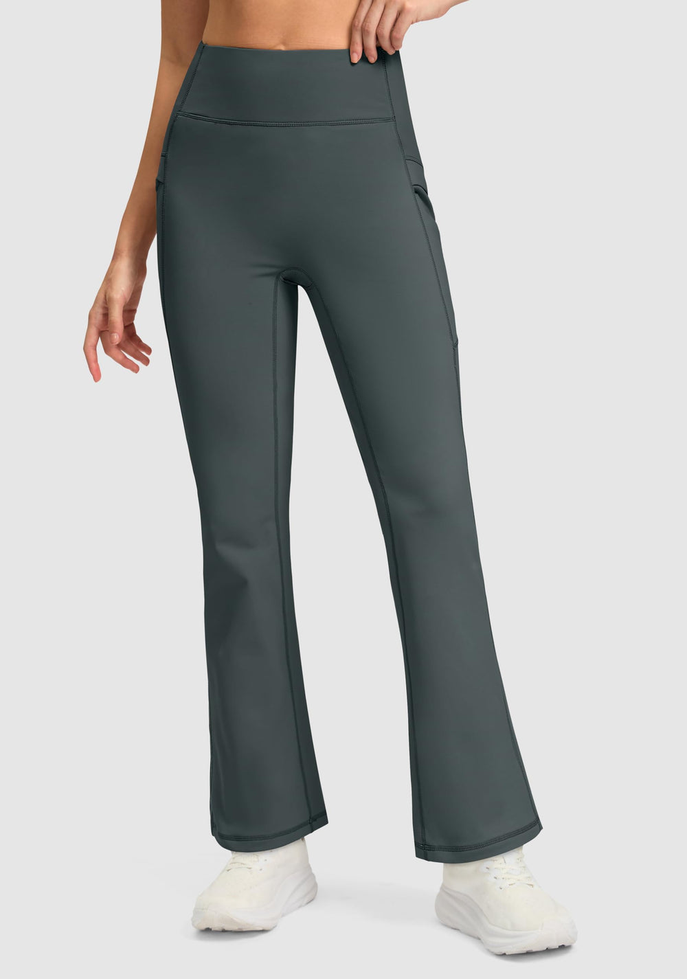 Jarvanv high-waist fleece-lined pants highlighting flattering silhouette for daily wear.