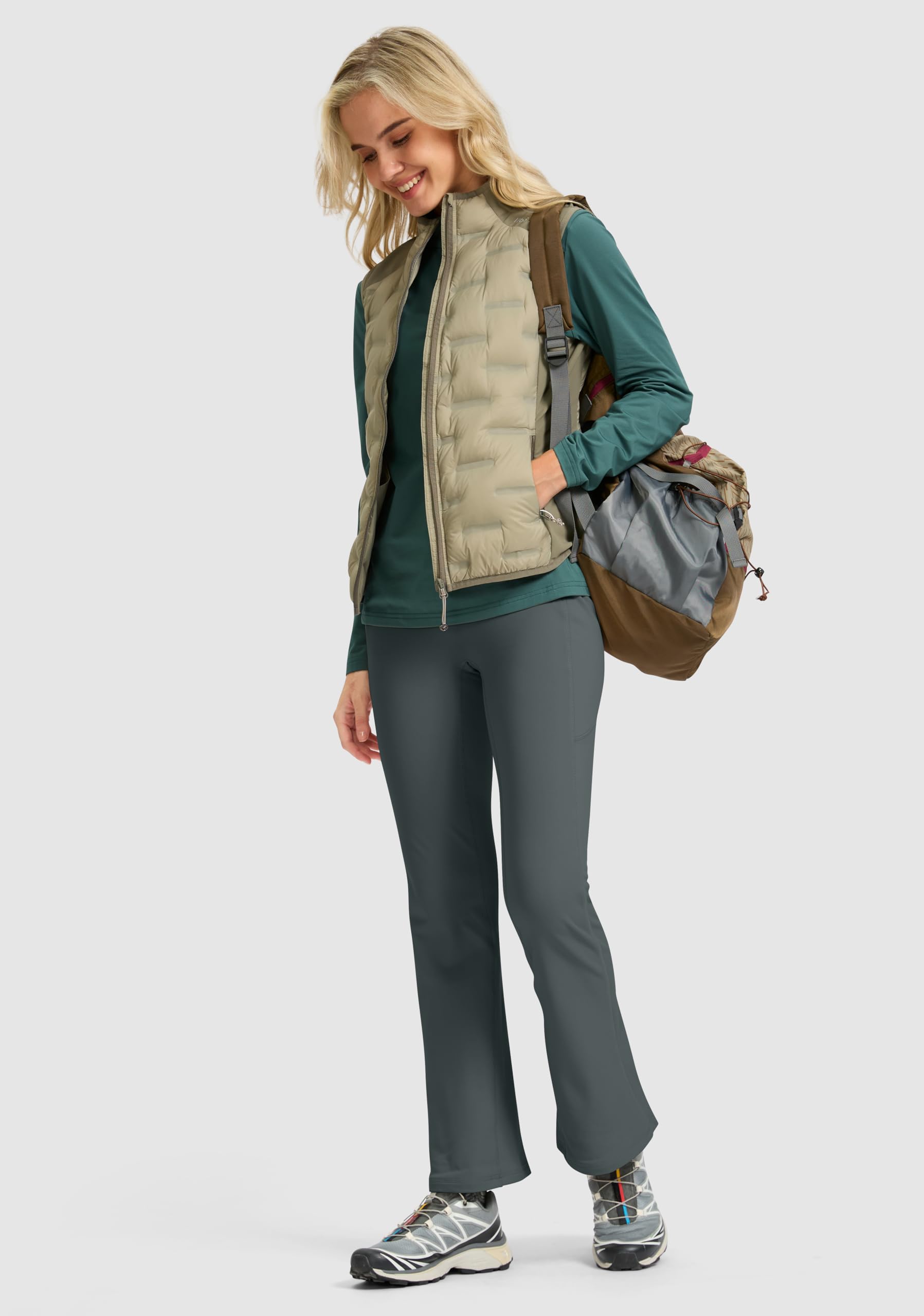 Jarvanv fleece-lined pants styled with boots for a winter-ready casual look.