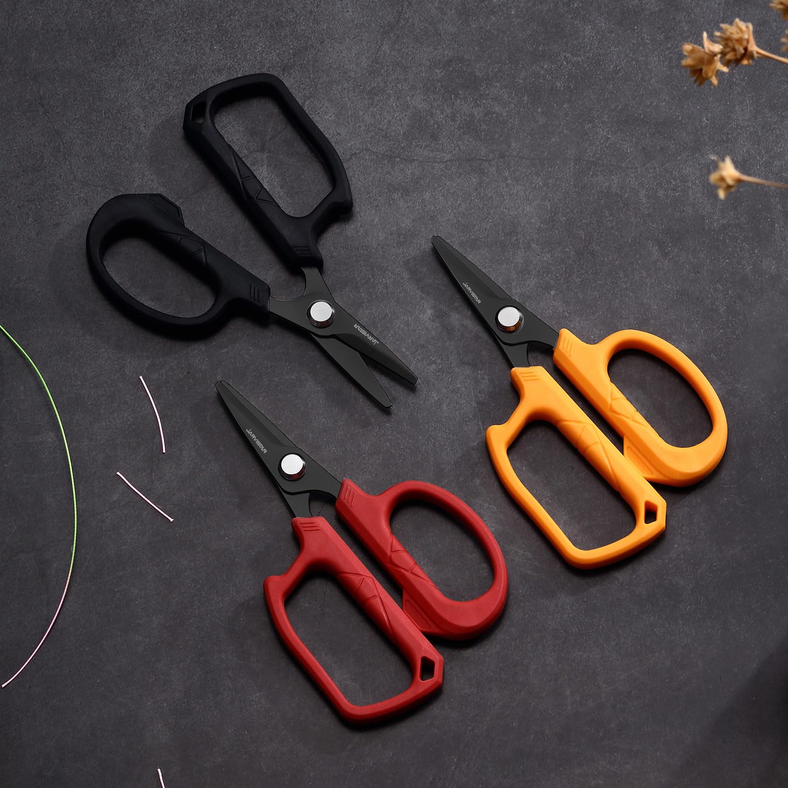 Compact 4.65 inch, 1.27 oz fishing scissors in orange