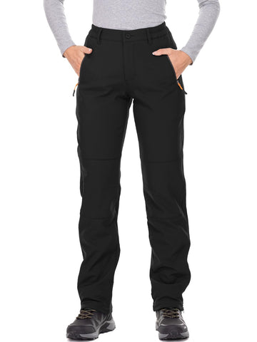 Jessie Kidden women's waterproof pants front view showing sleek shell and protection.