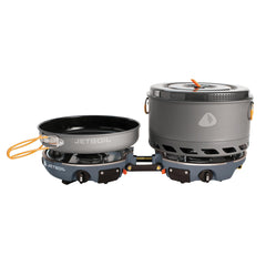 Jetboil Genesis dual-burner stove set up for fast backcountry meals.
