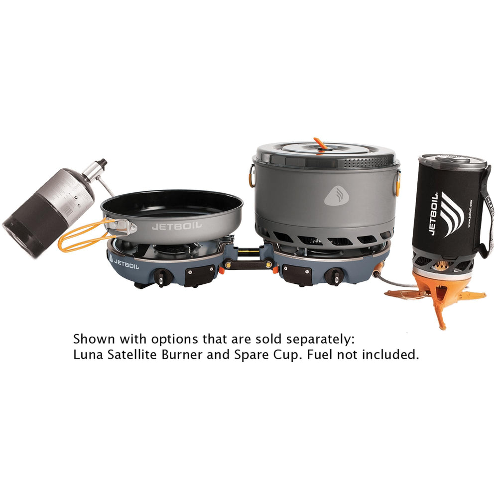 Genesis system in use at campsite, compact and capable for basecamp cooking.
