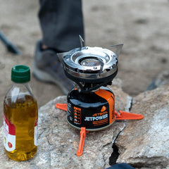 Stabilizer used on dirt and gravel surfaces to steady cooking setup