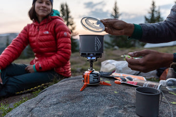 Jetboil Stash FluxRing cookpot highlights fast heating for quick meals.