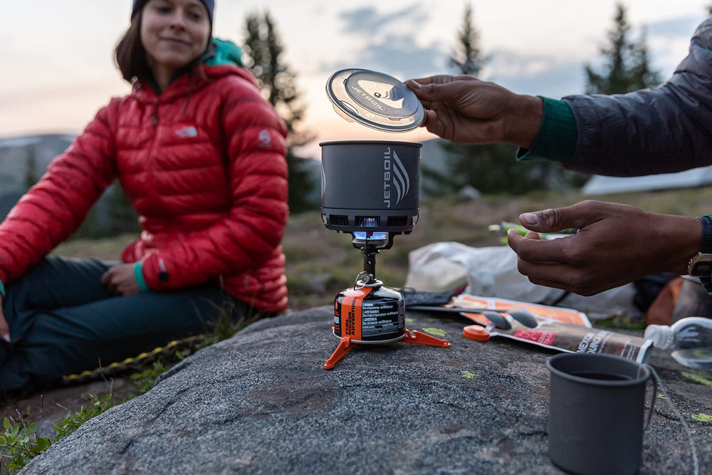 Jetboil Stash FluxRing cookpot highlights fast heating for quick meals.