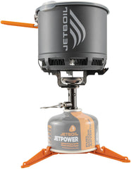 Jetboil Stash titanium burner image shows ultralight backcountry cooking on the go.