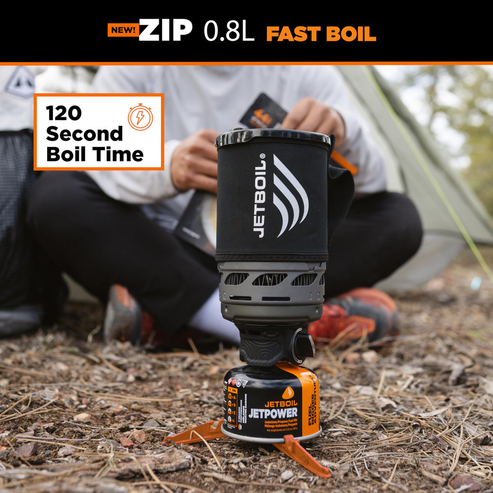 Jetboil Zip cooking cup with insulated cozy keeps water hot longer.