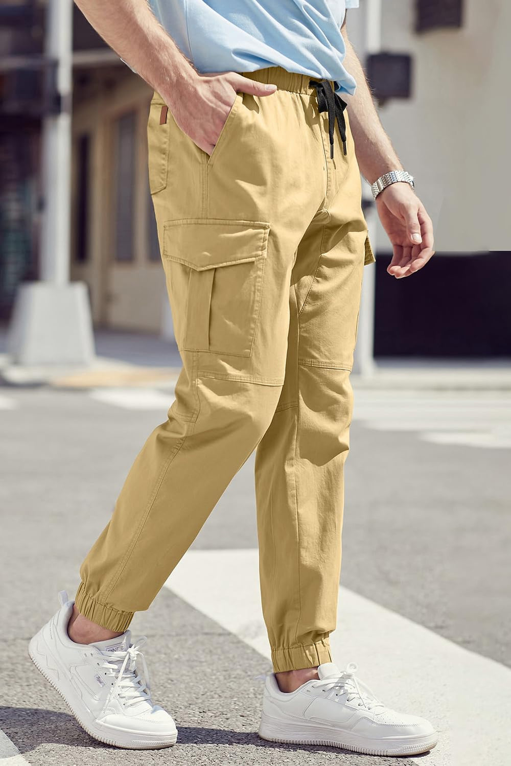 JMIERR men's cargo pants in motion demonstrating flexibility during activities.