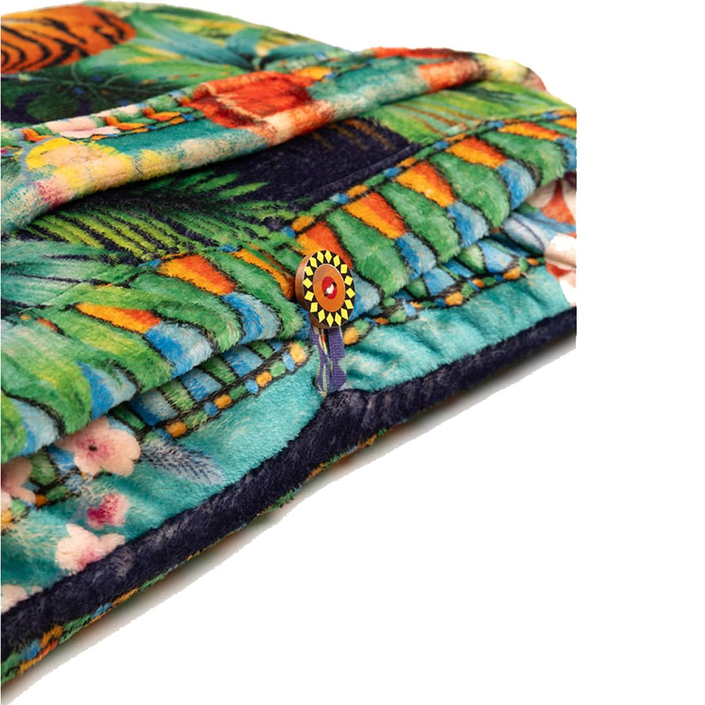 Johnny Was Tigres travel blanket packable design fits a carry-on.