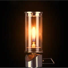 Jorzer camping lantern lit at dusk creates campsite ambience.