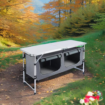 JOUYEK camping table storage lockers keep food and drinks organized.